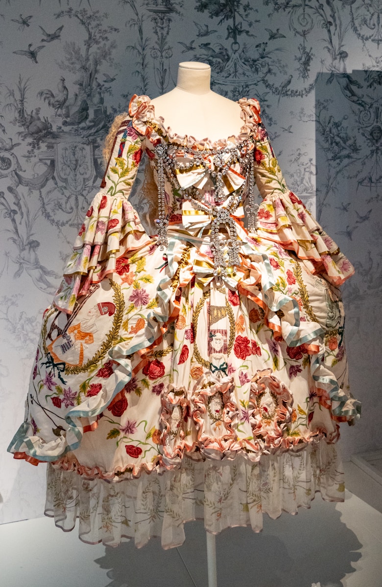 A dress on display in a glass case